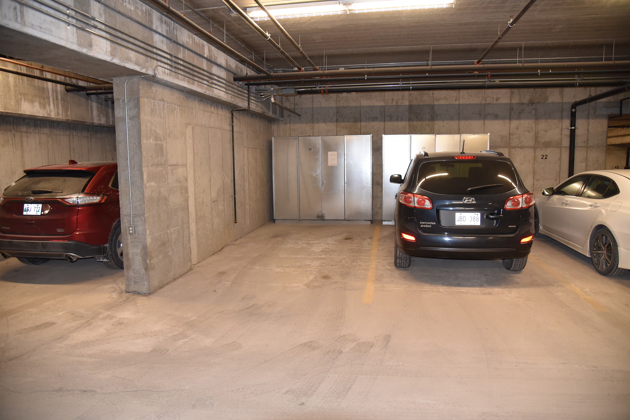 Indoor parking stall #24 and storage